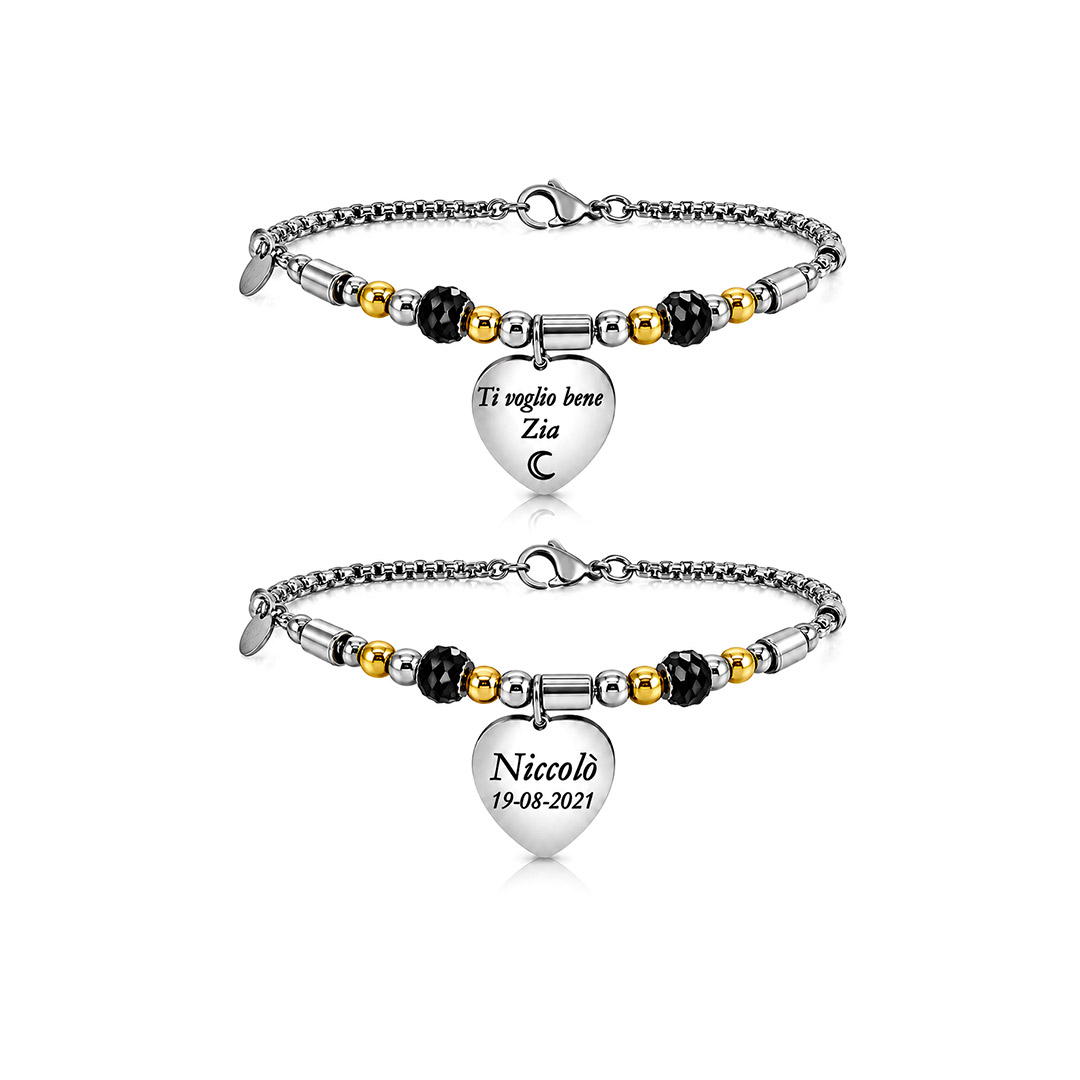 Bracciale per la zia personalizzato in acciaio inox con dettagli bicolore e ciondolo a cuore. L’incisione fronte e retro permette di aggiungere una dedica, un nome, una data o un simbolo speciale.